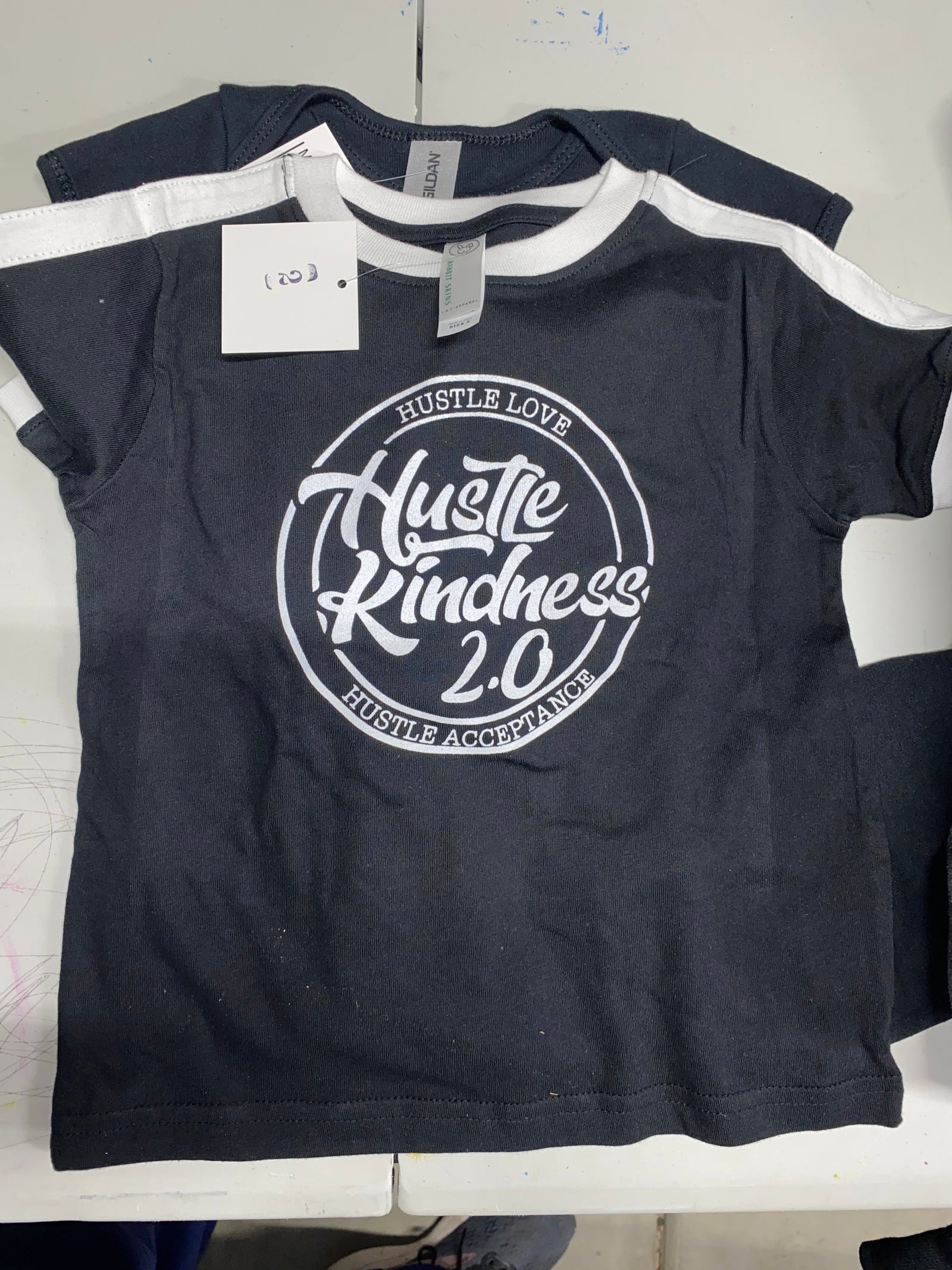 Hustle Kindness 2.0 Tiny hustlers black and white tee